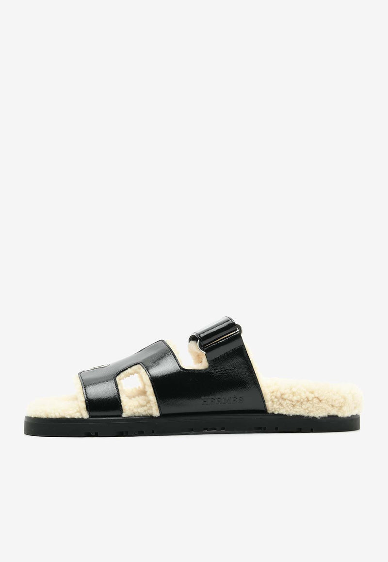 Hermès Chypre Sandals in Black Nappa Glace and Ecru Shearling CSBNGESHER