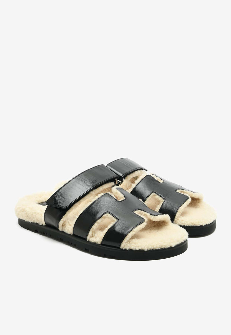 Hermès Chypre Sandals in Black Nappa Glace and Ecru Shearling CSBNGESHER