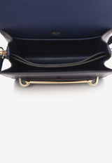 Hermès Mini Roulis 18 in Bleu Nuit Swift Leather with Permabrass Hardware