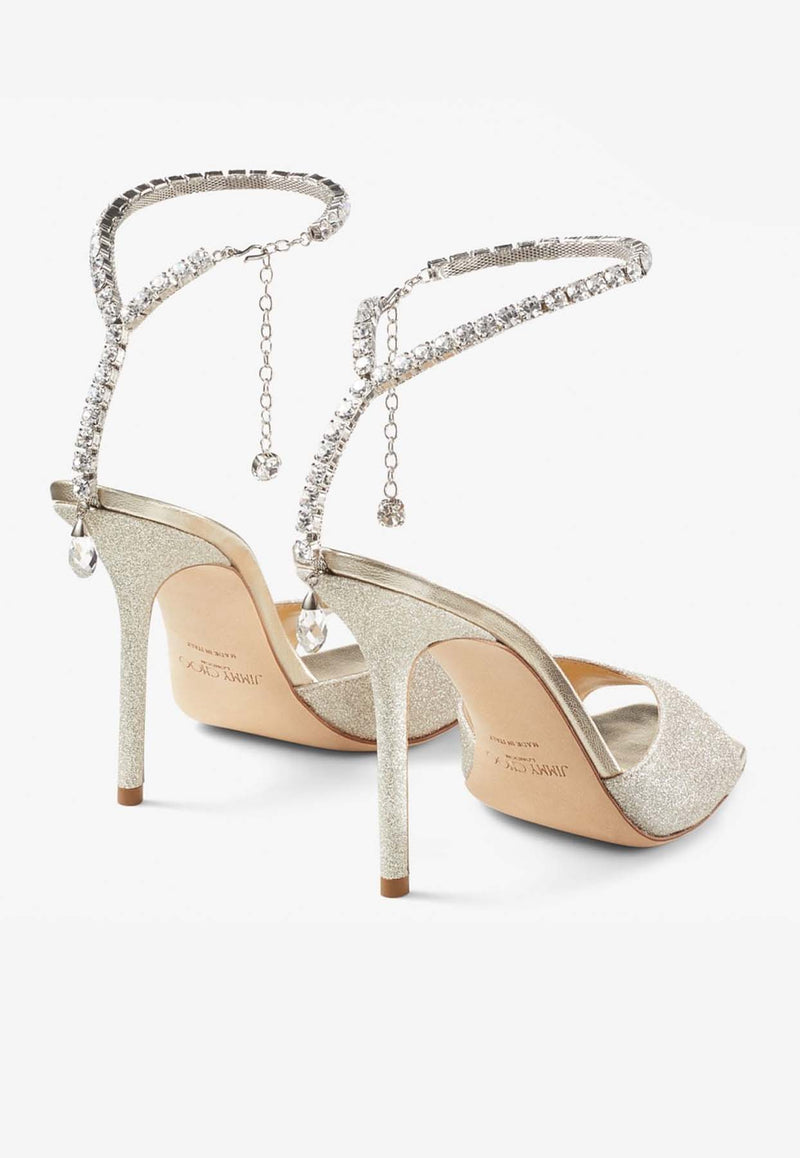 Jimmy Choo Saeda 100 Crystal-Embellished Glitter Sandals SAEDA SANDAL 100 GJV PLATINUM ICE/CRYSTAL