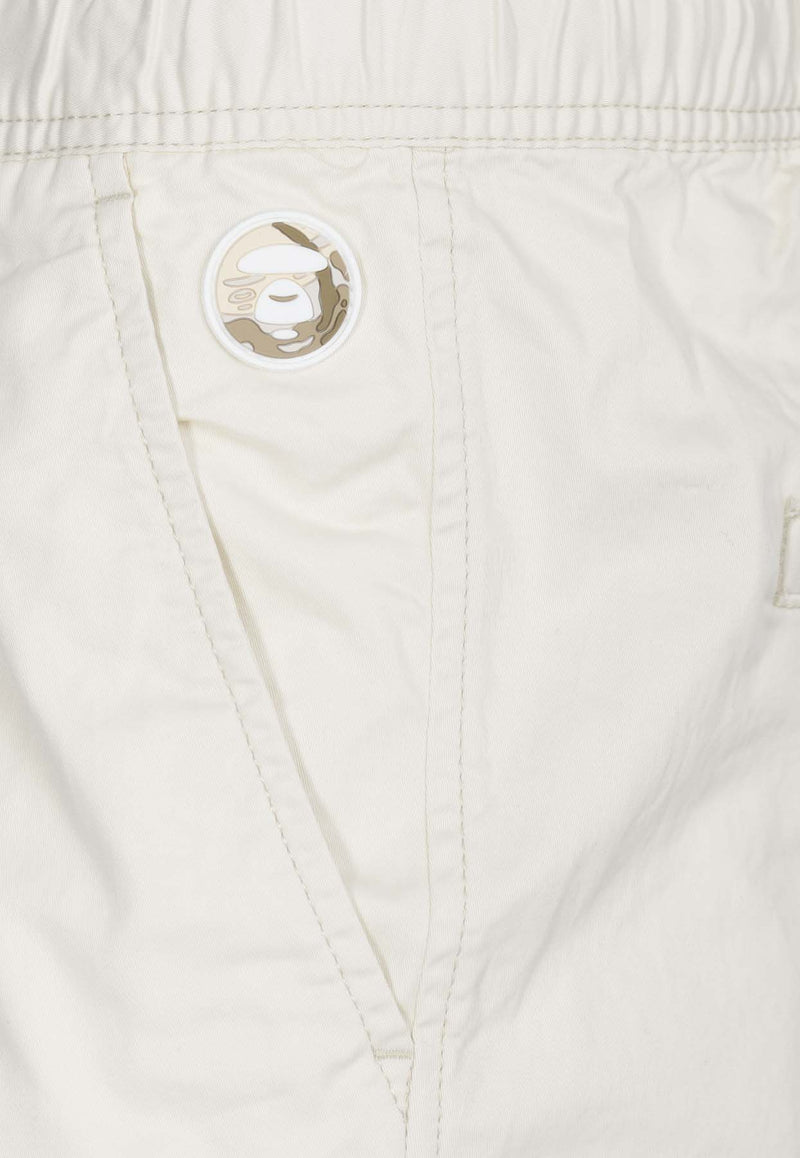 AAPE Now Logo Bermuda Shorts Ivory AAPSPMA668XXMIVXIVORY