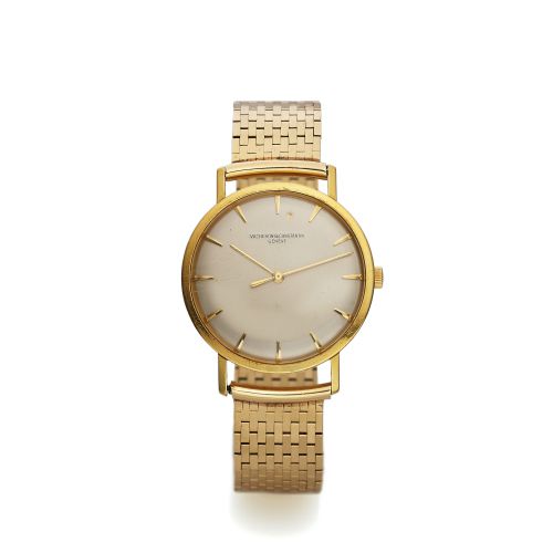 VACHERON & CONSTANTIN. REF. 6132 YELLOW GOLD. Vacheron & Constantin, Genève, No. 531027, case No.. 357545, Ref. 6132. Made in 1957.. Very fine, center seconds, 18K yellow gold wristwatch with a. 14K yellow gold brick link bracelet.