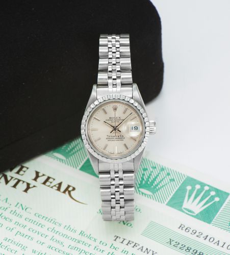 ROLEX REF. 69240 DATE RETAILED BY TIFFANY STEEL. Rolex, "Oyster Perpetual, Date, Superlative Chronometer Officially Certified", retailed by Tiffany & Co, case No. X228983. Ref. 69240/69000. Made in 1991.. Very fine and rare, center seconds, self-winding, 