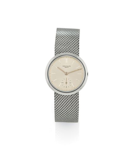 PATEK PHILIPPE & CIE REF. 3418.Patek Philippe & Cie, Genève, No. 728017, case No. 2605883, Ref. 3418. Made in 1957, sold on July 9th, 1959..Fine, water-resistant, stainless steel wristwatch with an integrated.stainless steel mesh bracelet. Accompanied by 