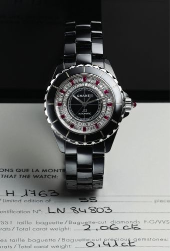 CHANEL REF. L.N. 84803, WHITE GOLD, BLACK CERAMIC.DIAMOND & RUBY.Chanel, Paris, J12 Automatic, Ref. L.N. 84803. Made circa 2005..Very fine, tonneau-shaped, curved, center seconds, self-winding, water resistant to 100 m, 18K white gold, ceramic.diamonds an