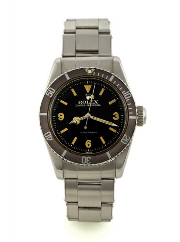 ROLEX, REF 6200, EXPLORER DIAL.Rolex, Oyster Perpetual, Submariner, No. 32257, Ref. 6200. Made circa 1954..Fine and very rare, center seconds, self-winding, water-resistant, stainless steel.diver's wristwatch with bi-directional revolving black bezel, lar