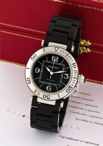 CARTIER, REF. 2970, PASHA SEATIMER.Cartier, Pasha Seatimer Automatic, case No. 447930PX, Ref. 2790. Sold in 2010..Fine, self-winding, water-resistant, large, stainless steel wristwatch with date and a.rubber Cartier link bracelet with concealed double dep