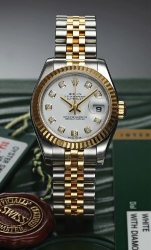 ROLEX REF. 179173 LADY DATEJUST STEEL & GOLD DIAMOND DIAL.Rolex, Oyster Perpetual Datejust, Superlative Chronometer Officially Certified,” case No. V624644, Ref. 179173. Made in 2009, sold October 28th, 2010. Fine, water-resistant, center seconds, self-wi