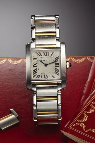CARTIER REF. 2301 TANK STEEL & GOLD QUARTZ.Cartier, Tank Française, case No. CC 180592.Ref. 2301. Made circa 2000..Fine, square and curved, water-resistant, stainless steel.and yellow gold quartz wristwatch with a stainless steel.and yellow gold Cartier l