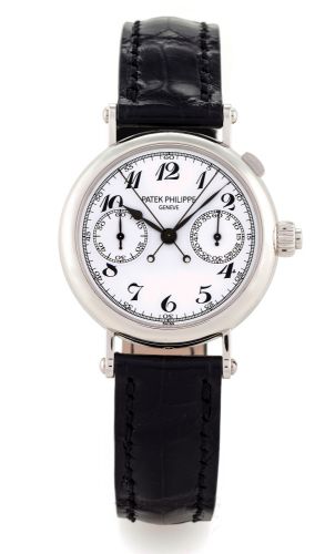 PATEK PHILIPPE REF. 5959 COAXIAL.SPLIT-SECONDS CHRONOGRAPH, PLATINUM.Patek Philippe, Genève, No. 3637090, case No. 4480360.Ref. 5959 P. Sold October 21st, 2009..Very fine and very rare, platinum and diamond wristwatch with.coaxial round button split-secon