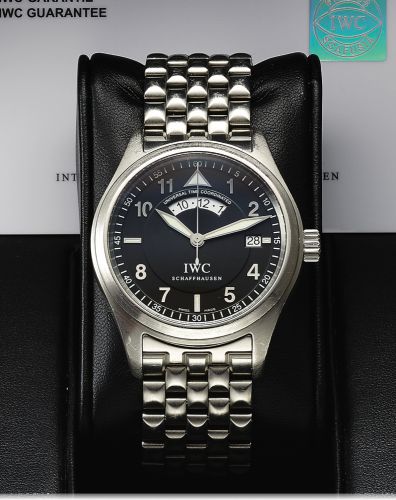 IWC REF. 3251 UTC PILOT STEEL.International Watch Co., Schaffhausen, Die Fliegeruhr - Universal Time.Coordinated, case No. 2889655, Ref. 3251. Sold April 13th, 2009..Fine, two-time zone, center seconds, self-winding, water-resistant.stainless steel wristw