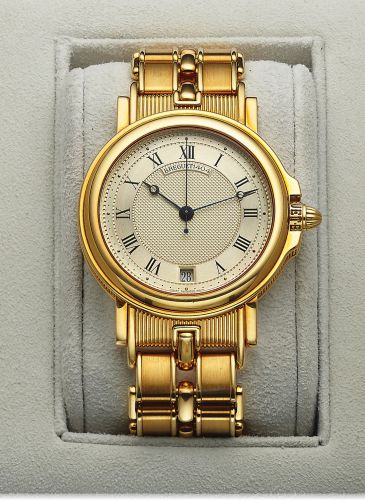 BREGUET REF. 3400 MARINE AUTOMATIC YELLOW GOLD.Breguet, Horloger de la Marine, Automatic, No. 1404, Ref. 3400 BA..Made in 1994..Fine, center seconds, self-winding, water-resistant, heavy 18K.yellow gold wristwatch with date and an 18K yellow gold Breguet.