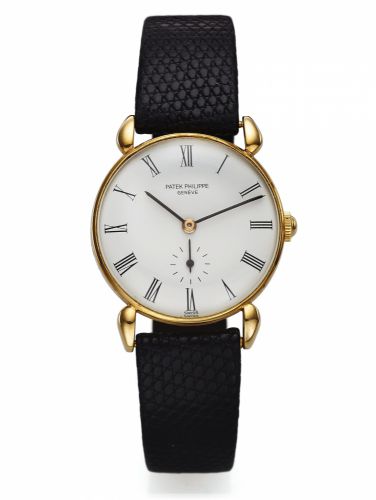 PATEK PHILIPPE REF. 590 CLAW LUGS YELLOW GOLD.Patek Philippe & Cie, Genève, No. 901522, case No. 636166.Ref. 590. Made circa 1944..Very fine and rare, 18K yellow gold wristwatch with an 18K.yellow gold Patek Philippe buckle. Accompanied by a fitted box.