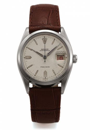 ROLEX REF. 6494 OYSTERDATE STEEL.Rolex, Oysterdate, Precision, case No. 15028, Ref. 6294..Made circa 1954..Fine and rare, center seconds, water-resistant, stainless.steel wristwatch with date and a stainless steel Rolex.buckle..Dial, case and movement sig