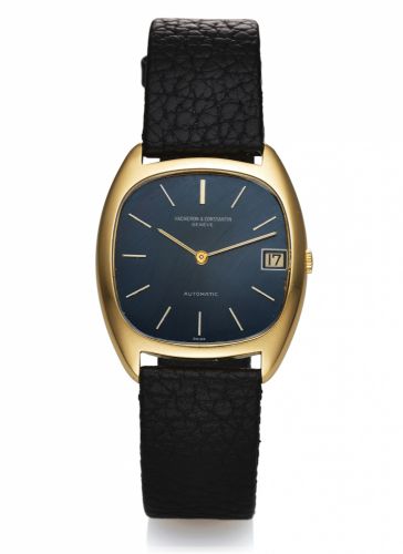VACHERON & CONSTANTIN.REF. 2020 YELLOW GOLD.Vacheron & Constantin, Genève, Automatic, No. 621704.case No. 466544, Ref. 2020 Q. Made circa 1980..Fine and rare, elegant, tonneau-shaped, self-winding.18K yellow gold wristwatch with date and a gold-plated.Vac
