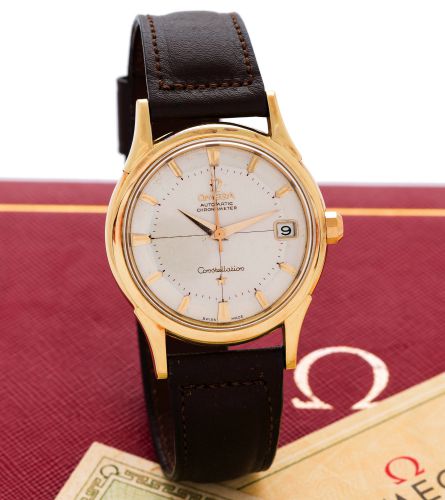OMEGA YELLOW GOLD CONSTELLATION.CALENDAR ORIGINAL BOX & PAPERS.Omega, Automatic, Chronometer, Constellation, movement.No. 17603224, Ref. 14393. Sold on February 10, 1962..Fine, center seconds, self-winding, water resistant, 18K yellow.gold Chronometer wri