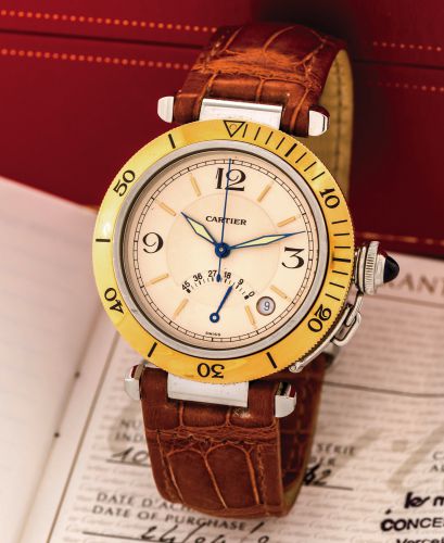 CARTIER REF. 1033 PASHA POWER RESERVE.STEEL & GOLD.Cartier, Pasha Power Reserve, No. CC49942, Ref. 1033..Sold in April 2002..Fine, center seconds, self-winding, water resistant to 330.ft/100 m, stainless steel and 18K yellow gold wristwatch with 45 hour p