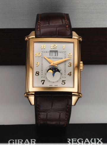GIRARD PERREGAUX VINTAGE 1945 XXL LARGE DATE MOON PHASES PINK GOLD.Girard-Perregaux, Large Date Moon-Phase, No. 49, Ref. 25882. Sold on April 29th, 2013..Very fine, square curved, self-winding, 18K pink gold wristwatch with large date, moon phases, lunar.
