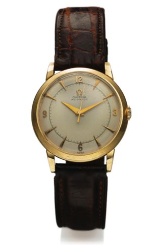 OMEGA REF. 6525 AUTOMATIC 14K YELLOW GOLD.Omega, Automatic, No. 12712314, Ref. G 6525. Made in the 1950's..Fine, center seconds, self-winding, yellow gold wristwatch with a.14K yellow gold Omega buckle.