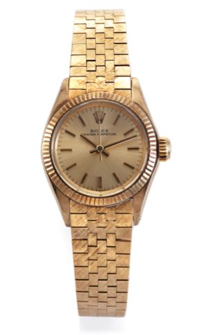 ROLEX REF. 6619 LADY'S YELLOW GOLD.Rolex, Oyster Perpetual, case No. 2074224.Ref. 6619. Made in 1968..Fine, center seconds, self-winding, water-resistant.14K yellow gold lady's wristwatch with a 18K yellow gold.textured Rolex bracelet and deployant clasp.