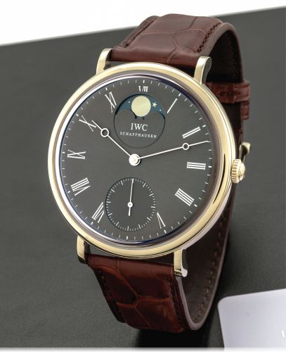 IWC PORTOFINO HAND WOUND.OVERSIZED WHITE GOLD.International Watch & Co., (IWC), Schaffhausen, Portofino.Hand-Wound, movement No. 3183727, case No. 33360739.Ref. IW544804. Made circa 2011..Very fine, large, 18K white gold wristwatch with moon phases.and a 