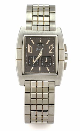 PIAGET UPSTREAM CHRONOGRAPH STEEL.Piaget, Upstream, No. 860263, Ref. 27150. Made circa 2005..Fine, stainless steel, tonneau-shaped, water-resistant, quartz.wristwatch with square-button chronograph, date and a.stainless steel Piaget bracelet.
