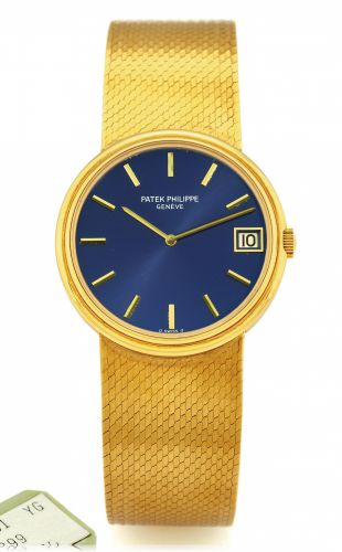 PATEK REF. 3601 AUTOMATIC BLUE DIAL & YELLOW GOLD.Patek Philippe, Genève, No. 1300899, Ref. 3601/101. Made in the 1980s..Fine, self-winding, thin, 18K yellow gold gentleman's wristwatch with date.and an 18K yellow gold integrated and textured Patek Philip
