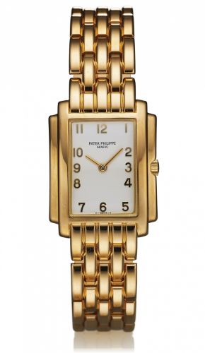 PATEK REF. 4824 GONDOLO.QUARTZ YELLOW GOLD.Patek Philippe & Cie, Genève, Gondolo, No. 1628793.case No. 2988664, Ref. 4824-1. Made in the 1990s..Very fine, rectangular curved, water-resistant, 18K yellow.gold midsize quartz wristwatch with an integral 18k.