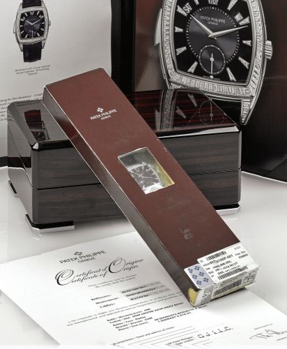 PATEK PHILIPPE REF. 5033 MINUTE REPEATER PERPETUAL.CALENDAR PLATINUM.DIAMOND DOUBLE SEALED.Patek Philippe, Genève, No. 5000188, case No. 4499723, Ref. 5033/100P..Extremely rare, fine and important, sealed, tonneau-shaped, Art Deco-style, minute-.repeating