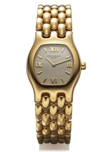 PATEK PHILIPPE REF. 4850.LADY'S QUARTZ YELLOW GOLD.Patek Philippe & Cie, Geneve, No. 1622976, case No. 2964242.Ref. 4850/1. Made in 1994..Very fine, tonneau-shaped and curved, 18K yellow gold lady's.quartz wristwatch with an 18K yellow gold Patek Philippe