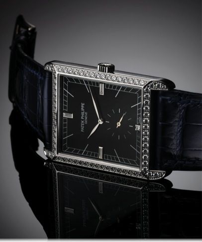 PATEK PHILIPPE REF. 5112 WHITE GOLD.DIAMOND GONDOLO.Patek Philippe, Genève, Gondolo, No. 3569299, case No. 4472769, Ref. 5112G. Made circa 2008..Very fine, large and thin, rectangular, 18K white gold and diamond wristwatch with an 18K white gold.Patek Phi