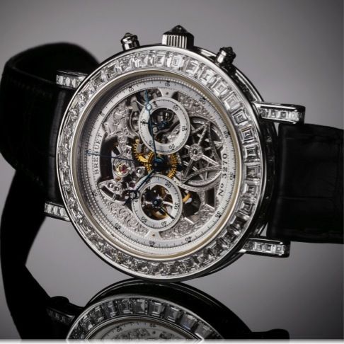 BREGUET REF. 5238 SKELETON CHRONOGRAPHE WHITE GOLD.DIAMONDS.Breguet, No. 3270, Ref. 5238. Made in the 2000s..Very fine and rare, skeletonized, 18K white gold and diamond-set wristwatch with round.button chronograph, register and an 18K white gold Breguet 