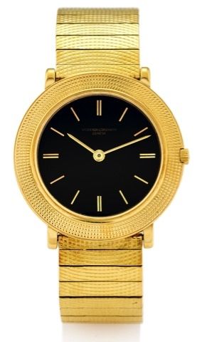 VACHERON & CONSTANTIN REF. 6395.BLACK DIAL YELLOW GOLD.Vacheron & Constantin, Genève, No. 544522, case.No. 370291, Ref. 6395. Made circa 1960..Fine and rare, small, extra-flat, water-resistant.18K yellow gold wristwatch with a detachable 18k.yellow gold b