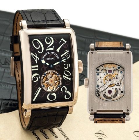 FRANCK MULLER CRAZY HOURS TOURBILLON WHITE GOLD.Franck Muller, Geneve, Crazy Hours Tourbillon No. 11, Ref. 1300 T CH. Sold on April 1st, 2008..Very fine and rare, large, curved rectangular, 18K white gold wristwatch with visible one-minute.flying tourbill