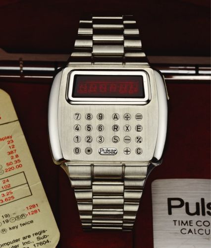PULSAR DIGITAL TIME COMPUTER CALCULATOR.ORIGINAL BOX PAPERS & PEN STEEL.Pulsar Digital Time Computer Calculator, case No. 722598..Made in 1976..Fine and very rare, large, water-resistant, cushion-shaped.stainless steel LED digital quartz wristwatch with i