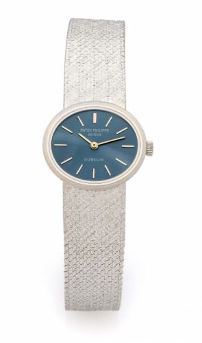 PATEK PHILIPPE RETAILED BY GUBELIN REF. 3349 WHITE GOLD A fine manual-winding 18K white gold lady's wristwatch.
