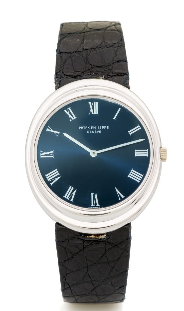 PATEK PHILIPPE, REF. 3594, WHITE GOLD A fine, self-winding, 18k white gold wristwatch.
