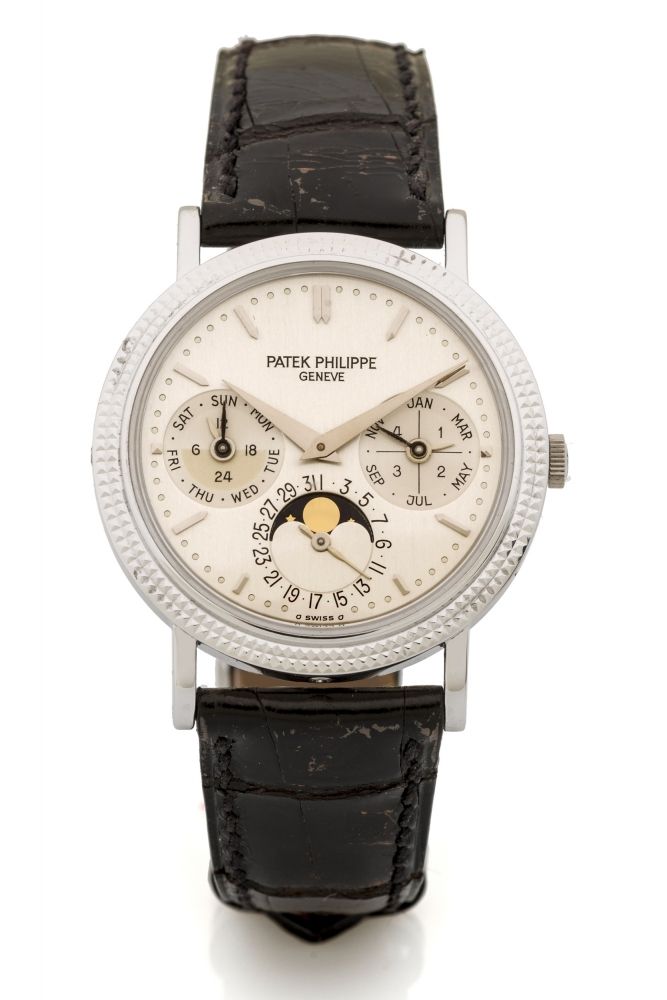 PATEK PHILIPPE PERPETUAL CALENDAr, ref. 5039 Fine, self winding, 18k white gold perpetual calendar with day, date, month, moon phase, leap year and 24h indication.
