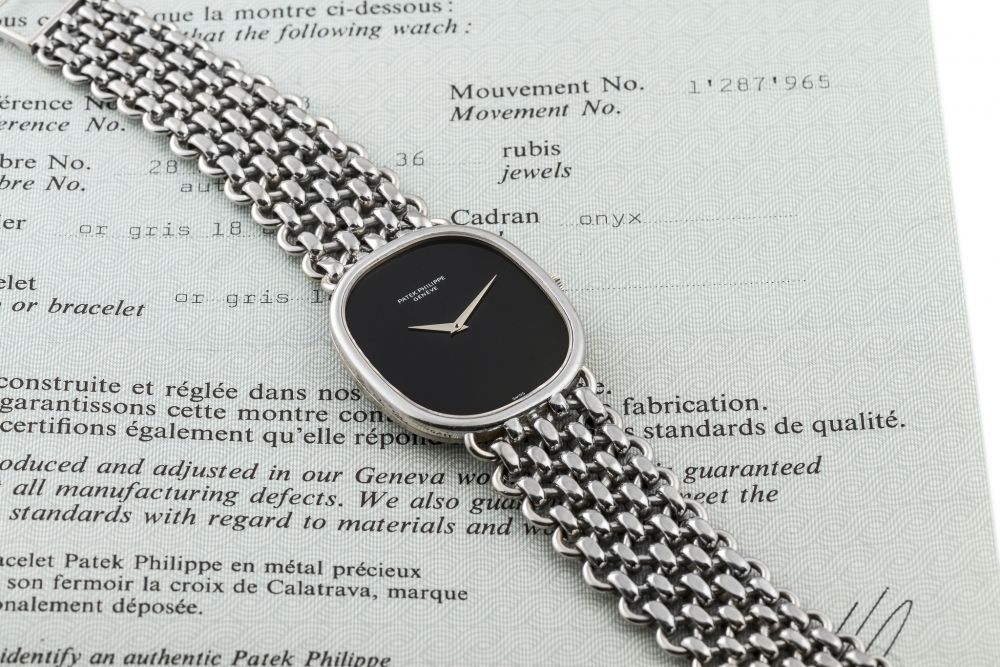 PATEK PHILIPPE, REF. 3605, JUMBO ELLIPSE, POSSIBLY UNIQUE ONYX DIAL (CUSTOM-ORDERED AT PATEK PHILIPPE) A fine, large and possibly unique, self-winding, 18k white gold wristwatch with factory-ordered onyx dial.