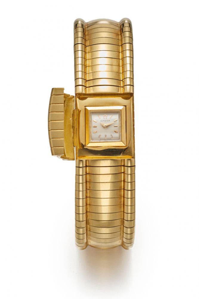 OMEGA REF. 8029, CONCEALED DIAL, “CONSTALLATION”-TYPE BRACELET. 18K YELLOW GOLD
