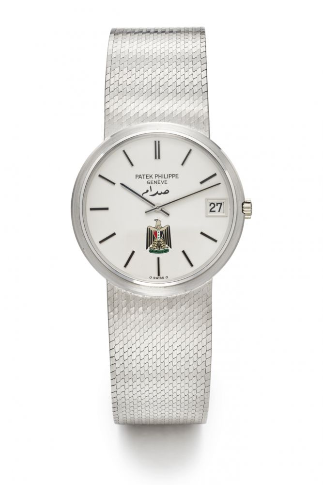PATEK PHILIPPE REF. 3601-1, DATE, “IRAQI EAGLE” DIAL, INTEGRATED BRACELET. 18K WHITE GOLD