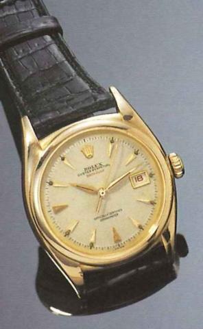 Rolex Oyster Perpetual Date Just, Officially.Certified Chronometer, Ref. 6104-6105, produced.in 2000 examples from 1951 to 1955..Fine center second, self winding, 18ct pink gold.gentleman's wristwatch with date.