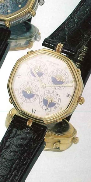 G_rald Genta, Ref. 2781.7, present series..Very fine and unusual, octogonal, four zone-time.18ct gold gentleman's wristwatch with fitted box.