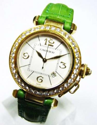 Cartier, Pasha, Ref. 2397. Produced in the 1990's.Very fine, round, mid-sized, center-seconds, self-winding, water-resistant to 100 m/330 ft, 18K yellow gold and diamonds gentleman's wristwatch with date and 18K yellow gold Cartier deployant clasp.