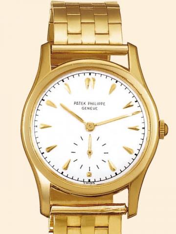 Patek Philippe & Cie, Geneve, No. 955074, case No. 657852, Ref. 2464. Production of this reference started in 1950.Fine and very rare, Calatrava-type, 18K yellow gold gentleman's wristwatch with 14K yellow gold tiled bracelet.