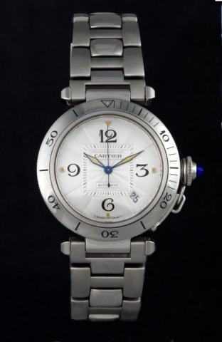 Cartier, Pasha, Automatic, Ref. 2378. Produced in the 1990s.Fine, center-seconds, self-winding, water-resistant, stainless steel gentleman's wristwatch with date and a polished and brushed stainless steel Cartier bracelet with deployant clasp.Accompanied 