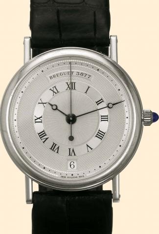 Breguet, No. 4473, Ref. 3320, 1990s. Fine flat, center-seconds, self-winding, 18K white gold gentleman's wristwatch with date, leather strap and 18K white gold buckle.