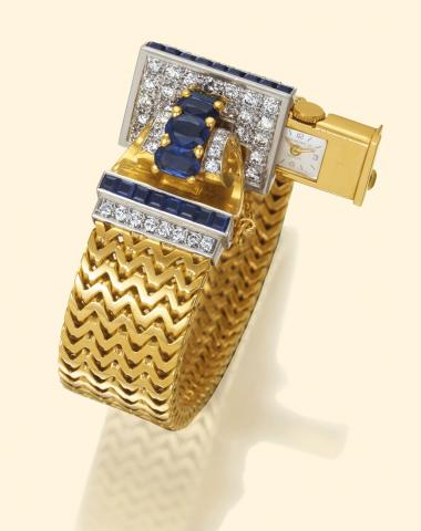Patek Philippe & Cie, Geneve, No. 842390, case No. 509111, Ref. 2126. Produced in 1945, sold on February 3, 1946. Exceptionaly fine and extremely rare, asymmetric, 18K yellow gold, platinum, sapphire and diamond lady's wristwatch 