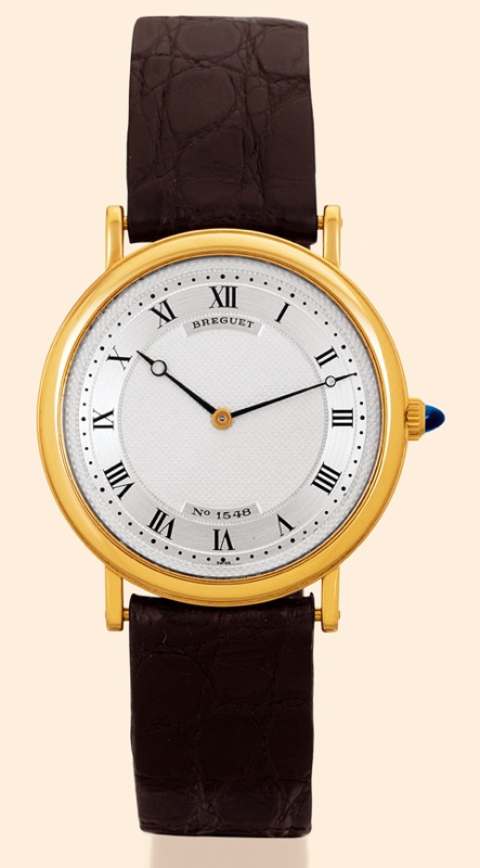 Automatic Breguet, No. 1548. Made in the 1970s. Very fine, thin and elegant, 18K yellow gold self-winding mid-sized gentleman's wristwatch with an 18K yellow gold Breguet buckle. Accompanied by a box.