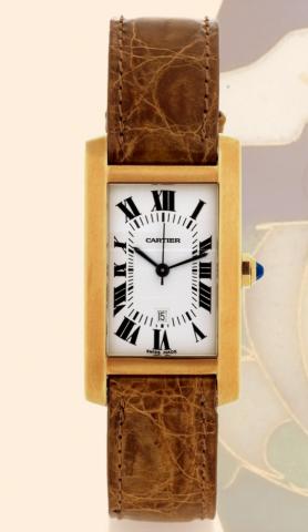 Tank Am_ricaine Cartier, Paris, Tank Am_ricaine, Automatic, Ref. 02860. Made in the 1990s..Very fine, rectangular, center-seconds, self-winding, water-resistant, 18K yellow gold gentleman's wristwatch with date and an 18K yellow gold Cartier buckle. Accom